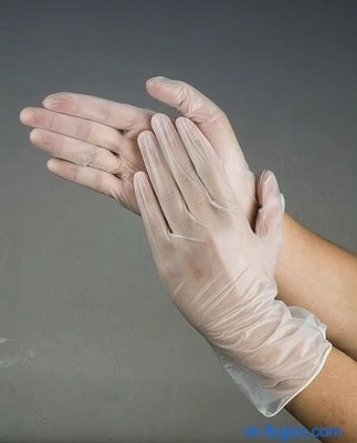guante disponible del vinilo del examen médico